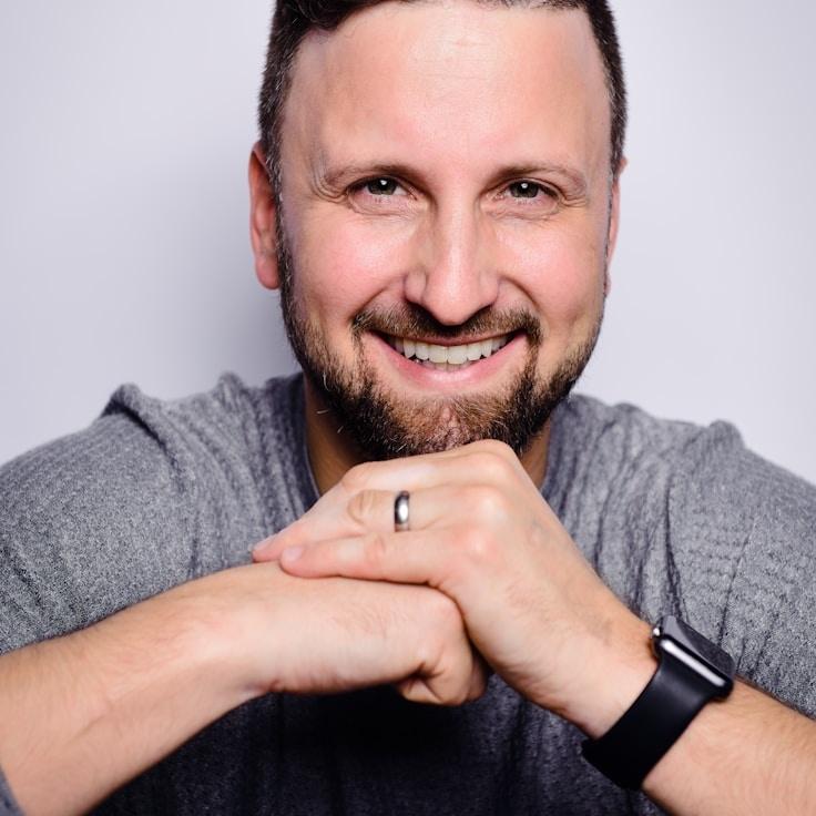 Kaveri Mehta, Lead Design Curator at WillowCrestAtlas, reviewing corporate floral arrangements